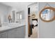 This bathroom features a white vessel sink and gray cabinets at 4826 Keel Ct., Myrtle Beach, SC 29579