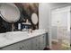 Bathroom featuring dual sinks with stylish fixtures and a modern aesthetic at 4826 Keel Ct., Myrtle Beach, SC 29579