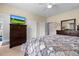 Bright bedroom with a dresser, TV, and double closets at 4826 Keel Ct., Myrtle Beach, SC 29579