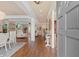 Inviting entryway featuring hardwood floors, decorative lighting, and an open view of the living spaces at 4826 Keel Ct., Myrtle Beach, SC 29579
