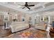 Spacious living room with an open floor plan, featuring a stylish rug and a seamless flow to the kitchen at 4826 Keel Ct., Myrtle Beach, SC 29579