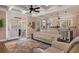 Open-concept living space with a comfortable couch and an adjacent kitchen at 4826 Keel Ct., Myrtle Beach, SC 29579