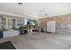 Covered patio area with BBQ grill and view to the backyard pool area at 4826 Keel Ct., Myrtle Beach, SC 29579
