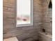 Shower area with tiled walls, a built-in bench, and a frosted glass window at 4826 Keel Ct., Myrtle Beach, SC 29579