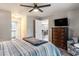 Well-lit bedroom features a view of the dining room and en-suite bathroom at 4853 Meadowsweet Dr. # 1805, Myrtle Beach, SC 29579
