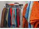 Spacious closet featuring colorful and diverse hanging clothes on metal racks at 4853 Meadowsweet Dr. # 1805, Myrtle Beach, SC 29579