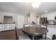 Dining area with a view of the kitchen; the table is surrounded by four cushioned chairs at 4853 Meadowsweet Dr. # 1805, Myrtle Beach, SC 29579