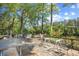 Expansive deck offering beautiful views of the surrounding trees and serene waterway at 515 River Rd., Conway, SC 29526