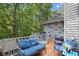 Outdoor deck with seating and wooded views at 515 River Rd., Conway, SC 29526
