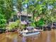 Waterfront home featuring a private boat dock and scenic views of the river at 515 River Rd., Conway, SC 29526