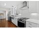 Bright kitchen featuring stainless steel appliances, white cabinetry and subway tile, offering a modern and clean design at 515 River Rd., Conway, SC 29526