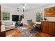 Home office with hardwood floors, natural light, modern furnishings, and a neutral color palette at 515 River Rd., Conway, SC 29526