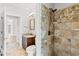 Neutral bathroom featuring a granite countertop, tile flooring, and tiled shower at 528 Chamberlin Rd., Myrtle Beach, SC 29588
