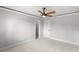 Neutral bedroom provides versatile space with closet and doorway with neutral carpet at 528 Chamberlin Rd., Myrtle Beach, SC 29588