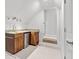 Bonus room area with carpeting, kitchenette and bar sink, illuminated by recessed lights at 528 Chamberlin Rd., Myrtle Beach, SC 29588