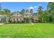 Charming home boasts a manicured lawn, lush landscaping, and a welcoming entrance at 528 Chamberlin Rd., Myrtle Beach, SC 29588