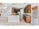 Spacious kitchen features granite countertops, wood cabinets, and stainless-steel appliances at 528 Chamberlin Rd., Myrtle Beach, SC 29588