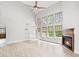 Bright living room features wood floors, soaring ceilings, fireplace and many windows at 528 Chamberlin Rd., Myrtle Beach, SC 29588