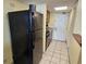 Well-lit kitchen with tile floors, ample cabinet space, and modern appliances at 5300 N Ocean Blvd. # 306, Myrtle Beach, SC 29577
