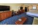 Cozy living space with seating area, tv, and dining table at 5300 N Ocean Blvd. # 306, Myrtle Beach, SC 29577