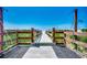Charming boardwalk leads to the beach, enhanced with convenient shower stations for a refreshing experience at 5310 N Ocean Blvd. # 10B, North Myrtle Beach, SC 29582