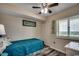 Cozy bedroom with wood floors, queen bed, and serene natural light at 5310 N Ocean Blvd. # 10B, North Myrtle Beach, SC 29582