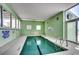 Inviting indoor pool area with natural lighting and easy access entry points for a refreshing swimming experience at 5310 N Ocean Blvd. # 10B, North Myrtle Beach, SC 29582