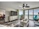 Comfortable living room with ocean view and large-screen TV, perfect for relaxing and entertaining guests at 5310 N Ocean Blvd. # 10B, North Myrtle Beach, SC 29582