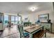Bright living room features wood floors, ocean views, and stylish coastal furnishings at 5310 N Ocean Blvd. # 10B, North Myrtle Beach, SC 29582