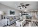 Charming living room showcasing stylish decor, comfortable furniture, and seamless flow to the dining area and kitchen at 5310 N Ocean Blvd. # 10B, North Myrtle Beach, SC 29582