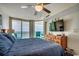 Comfortable main bedroom with balcony access and scenic ocean views at 5310 N Ocean Blvd. # 10B, North Myrtle Beach, SC 29582