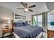 Main bedroom with ocean view, balcony access and stylish decor at 5310 N Ocean Blvd. # 10B, North Myrtle Beach, SC 29582