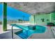 Scenic view of a pool area, complete with poolside seating and a clear blue sky at 5310 N Ocean Blvd. # 10B, North Myrtle Beach, SC 29582