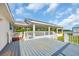 View of large deck area with outdoor covered space that provides entertainment possibilities at 5589 Highway 668, Conway, SC 29526
