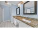 Bathroom features double sinks with granite countertop and tile floor at 5589 Highway 668, Conway, SC 29526