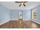 Light filled bedroom showcasing modern flooring and neutral walls at 5589 Highway 668, Conway, SC 29526