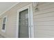Exterior view of the unit's front door, showing the address number at 5750 Oyster Catcher Dr. # 822, North Myrtle Beach, SC 29582