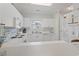 Efficient kitchen with white cabinetry, modern appliances, and ample counter space at 5750 Oyster Catcher Dr. # 822, North Myrtle Beach, SC 29582
