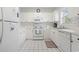 Well-lit kitchen featuring white appliances, cabinets, ample countertop space, and a functional layout at 5750 Oyster Catcher Dr. # 822, North Myrtle Beach, SC 29582