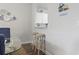 Dining area featuring two stools with a pass through to the kitchen at 5801 Oyster Catcher Dr. # 332, North Myrtle Beach, SC 29582