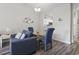 Living space and Dining Area features a glass table with comfortable seating in close proximity to the kitchen at 5801 Oyster Catcher Dr. # 332, North Myrtle Beach, SC 29582
