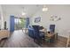Bright living area with vaulted ceilings, a ceiling fan, and a sliding glass door to a balcony at 5801 Oyster Catcher Dr. # 332, North Myrtle Beach, SC 29582