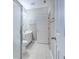Bright bathroom featuring a single vanity, tile flooring, and a glass shower enclosure at 601 N Hillside Dr. # 4434, North Myrtle Beach, SC 29582