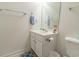 Half bathroom featuring a pedestal sink, toilet, and modern fixtures at 6203 Catalina Dr. # 1333, North Myrtle Beach, SC 29582