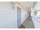 Condo exterior featuring a walkway, exterior door, and building number, providing easy access to the unit at 6203 Catalina Dr. # 1333, North Myrtle Beach, SC 29582