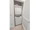 Laundry closet with a stacked washer and dryer in a small space at 6203 Catalina Dr. # 1333, North Myrtle Beach, SC 29582