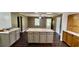The kitchen has a center island with lots of storage in an open floor plan at 6805 Mclaurin Rd., Mullins, SC 29574