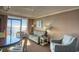 Cozy living area with ocean views, comfortable seating, and dining space at 6900 N Ocean Blvd. # 1041, Myrtle Beach, SC 29577