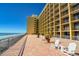 Patio with outdoor seating to enjoy the beach view at 6900 N Ocean Blvd. # 1041, Myrtle Beach, SC 29577