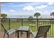 Relax on the balcony with ocean views and swaying palm trees at 6900 N Ocean Blvd. # 222, Myrtle Beach, SC 29572